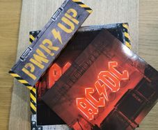 AC/DC Power Up deluxe with active packaging