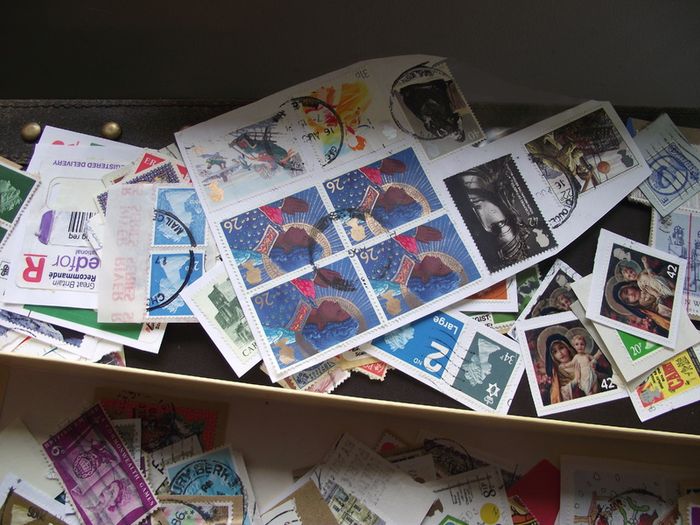 A box with collection of stamps from Great Britain