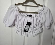 Brand new white off-shoulder smocked crop top with puff sleeves, size 6