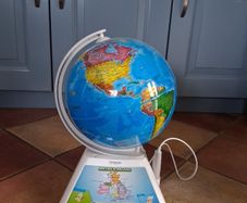 Kids touch globe