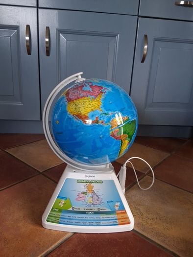 Kids touch globe