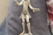 The figurine is a vintage