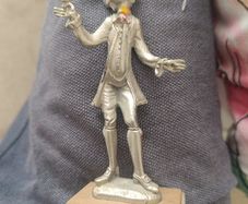 The figurine is a vintage