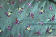 Green fabric with flower design
