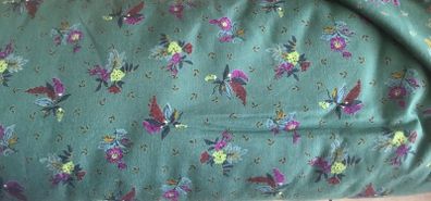 Green fabric with flower design