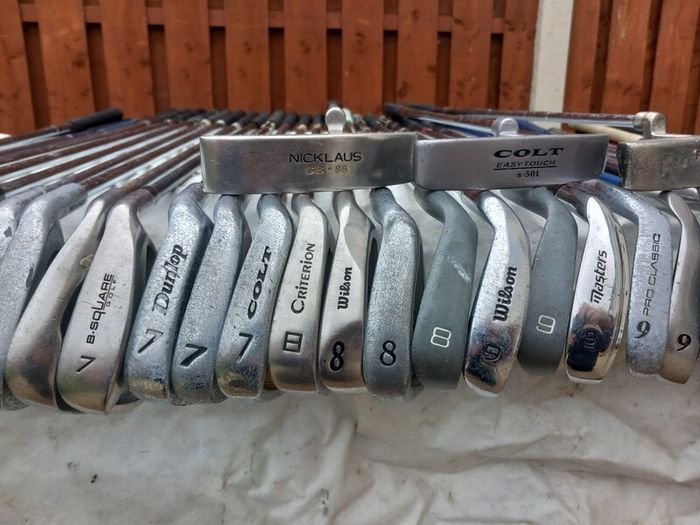 A selection of golf clubs and bags. NOT SELLING SEPARATE