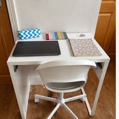 White desk + office chair on wheels