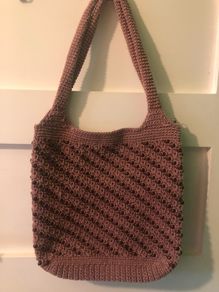 Brown knitted handbag with beads
