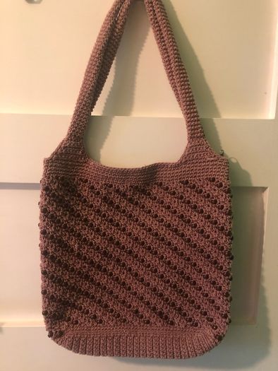 Brown knitted handbag with beads