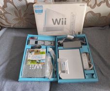 Wii with box, two controllers, sports and HDMI adapter