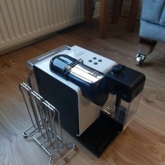 coffee machine and pod holder