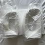 Brand new modern, hollow-center white ceramic/porcelain decorative donut-shaped vases. Image 5