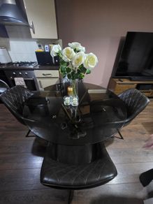 Glass Table And Swivel Chairs
