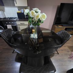 Glass Table And Swivel Chairs