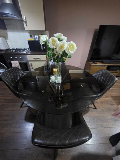 Glass Table And Swivel Chairs