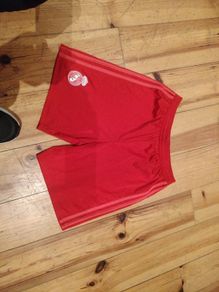 Red Adidas football shorts age 13-14