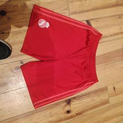 Red Adidas football shorts age 13-14