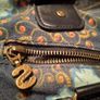 shoulder bag is from the brand Desigual. Image 10