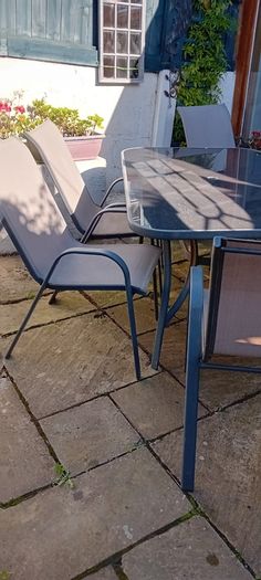 Glass top Garden table and chairs