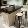 Rustic kitchen island with double overhang Image 4