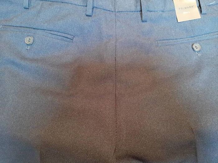 New navy trousers tag attached