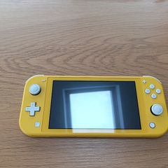 Nintendo Switch Lite (Yellow) + 5 Games + Case