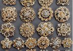 24 Gold Brooches