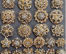 24 Gold Brooches