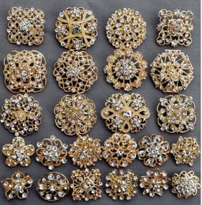 24 Gold Brooches