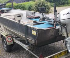 Fishing boat and trailer
