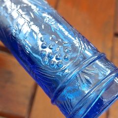 Vintage! cobalt blue cornucopia bottle embossed with grapes and vines retro bar deco ,collectors item,buyer collects or pays postage thank you, see pictures for condition,