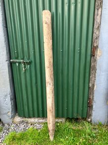 Half round wooden fence post