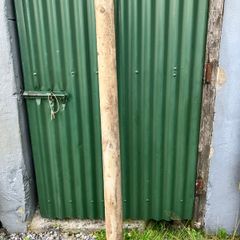 Half round wooden fence post