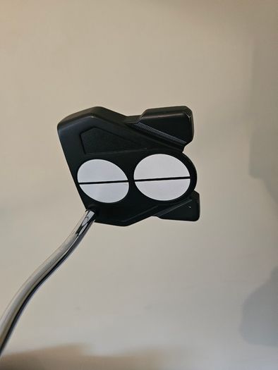 Odyssey broomstick putter.