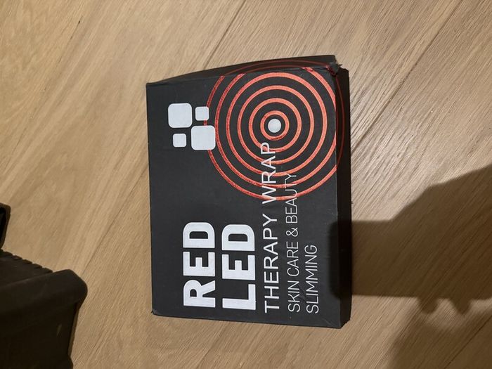 Red LED body wrap with USB cable and box