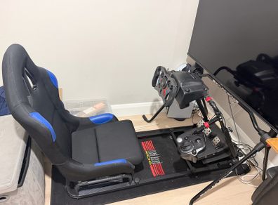Sim Racing Cockpit + Next Level Racing TV Stand & Floor Mat