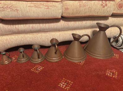 Vintage copper gallon funnels