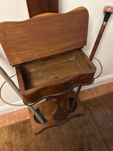 antique hall stand in good condition, very neat and a glove compartment in centre,