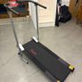 Manual Compact foldable treadmill with transportation wheels for easy portability.   Folded dimension: 20Lx23Wx50h in. Image 8