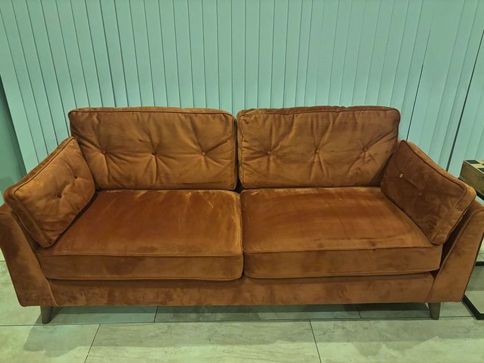 3 seater burnt orange sofa