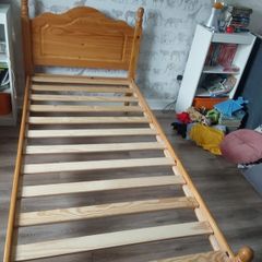 Wooden single bed