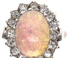 Large 9k gold with silver Opal ring