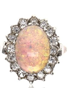 Large 9k gold with silver Opal ring