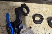 Quadlock with damper