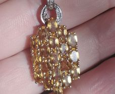 Pendant made of 925 silver with citrines and diamonds