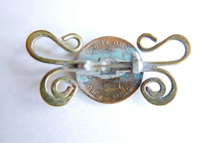 Vintage Twisted brass and Copper Foreign Coin Pin