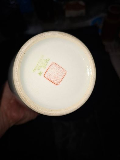 Chinese porcelain vase from the Jingdezhen region featuring a hand painted peacock and floral motif., Postage Available