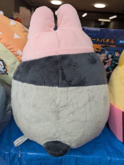 Koupen Chan with rabbit hat plushie