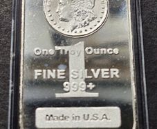Highland Mint (HM) 1 Oz Morgan Design Silver Bar