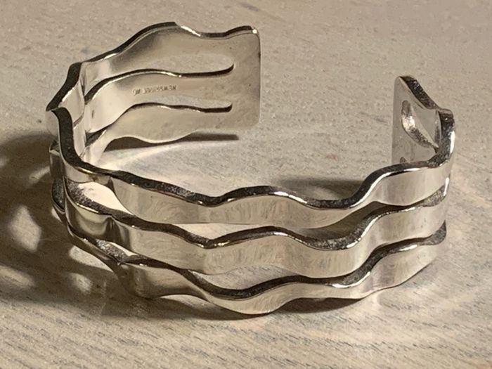 Silver bracelet and earrings